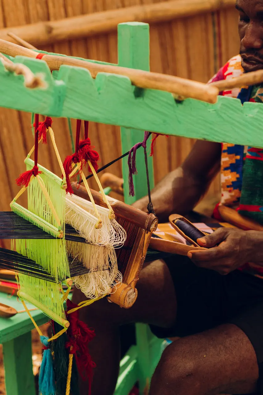 Weaver at a traditional loom